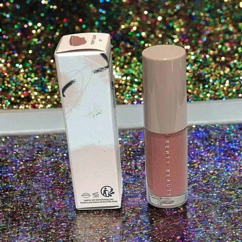 FENTY BEAUTY Gloss Bomb Universal Lip Luminizer in FENTY Glow .07 Oz New In Box
